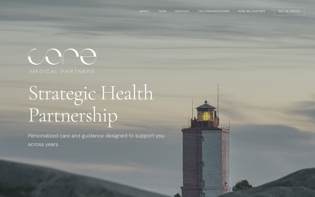 Core Medical Partners homepage — lighthouse at dusk behind a serif headline.