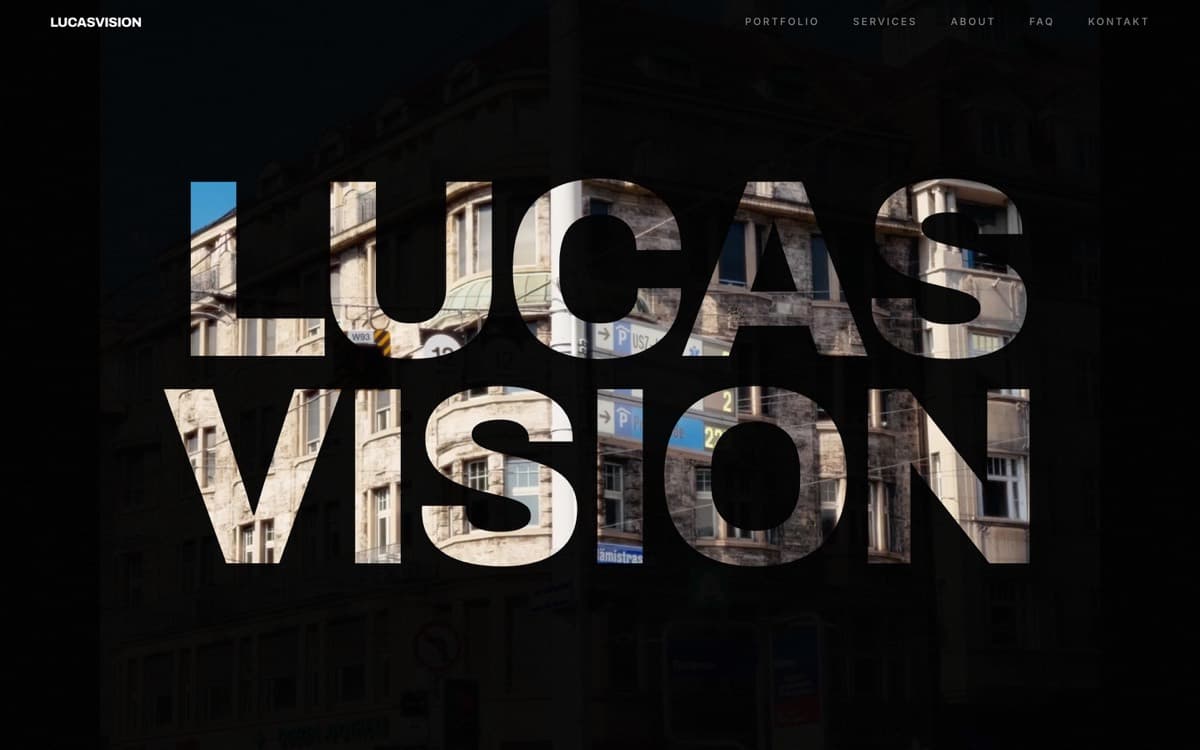 LucasVision homepage — city façade showing through the letters of the name.