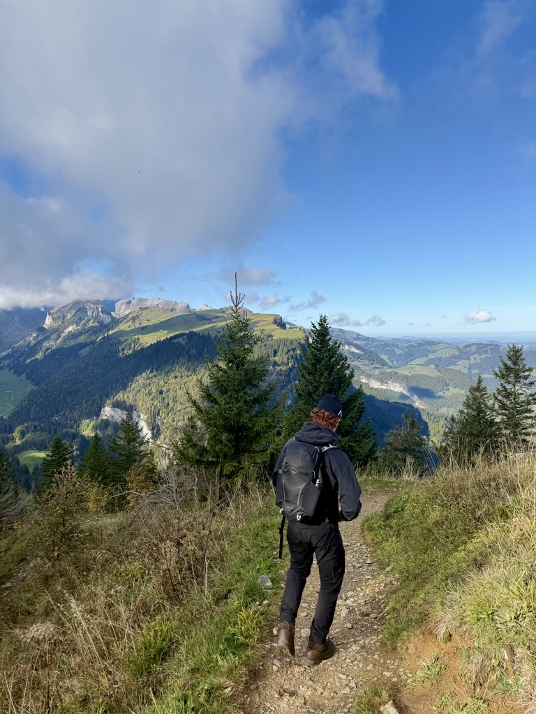 Colin walking along an alpine path