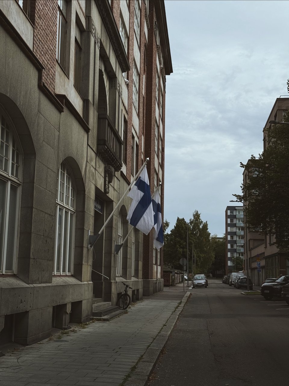 A city street with Finnish flags